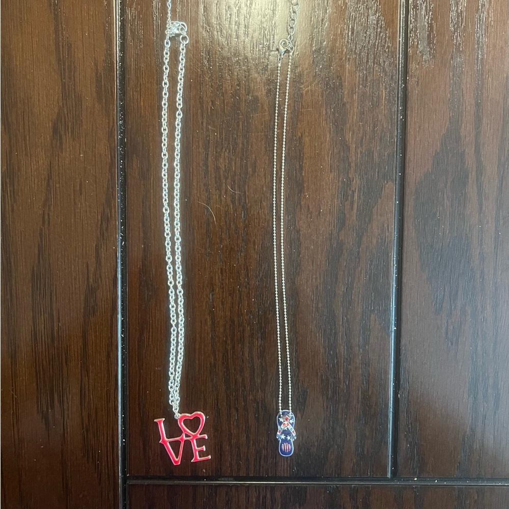 2 Girl’s Silver Tone Chain Necklaces- One has Flip Flop Charm One has LOVE Charm